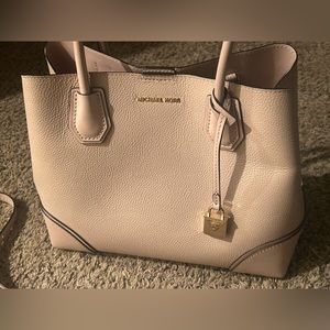 Light pink crossbody Michael Kors purse